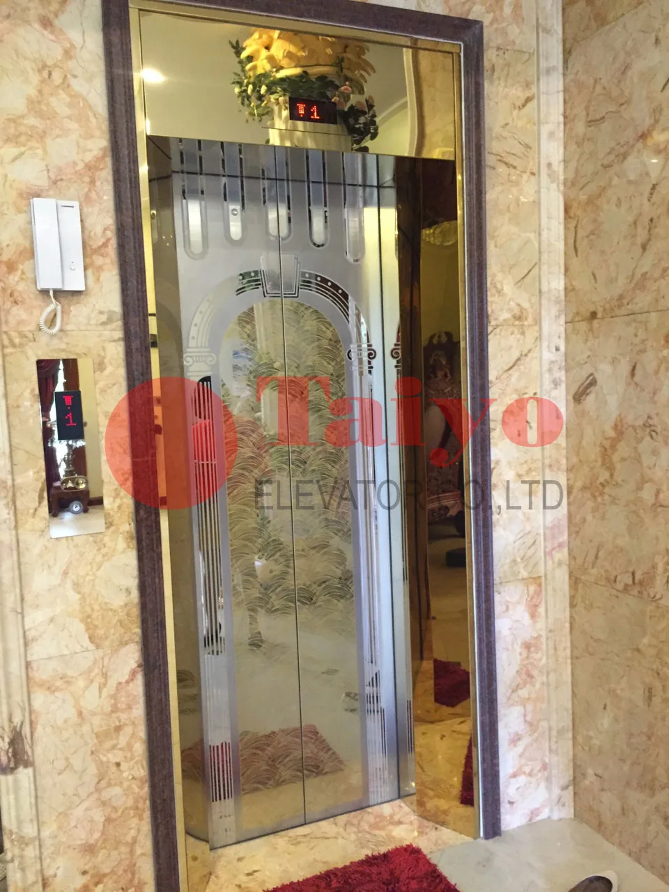 Cửa thang máy bằng inox trạm khắc hoa văn theo yêu cầu